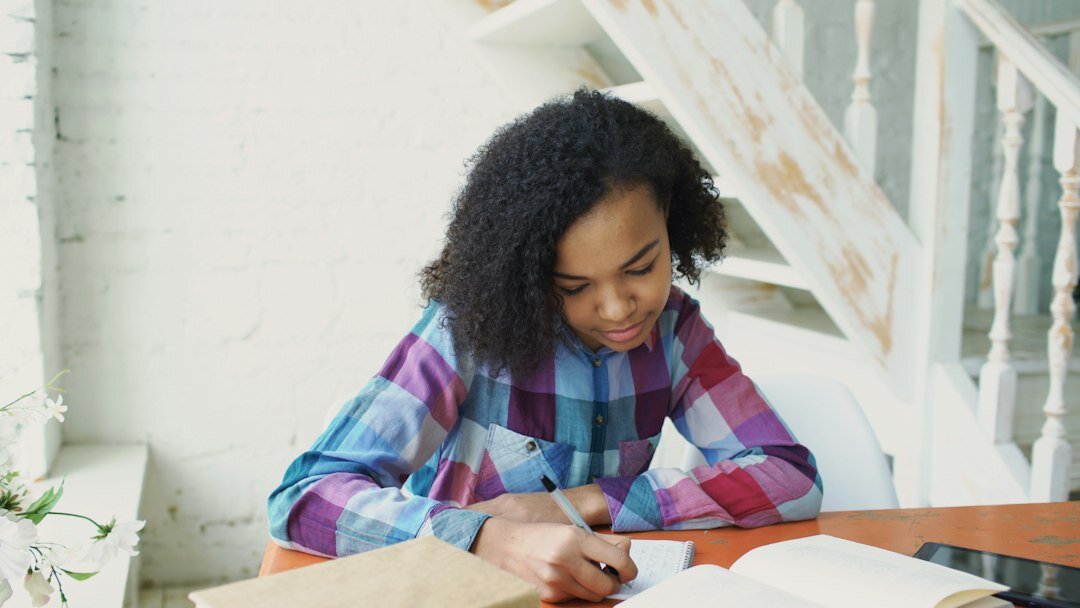 young writer at desk